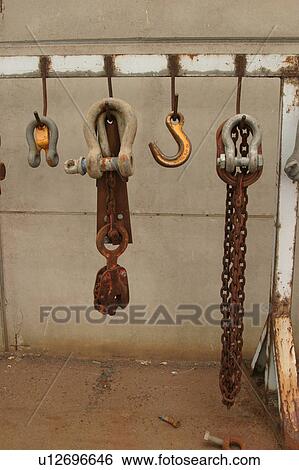 Stock Photograph - chain, wall, detritus, debris, junk, appearance. Fotosearch