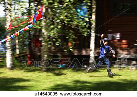 Stock Photography - Child, kid, boy, outdoors, day, daytime. Fotosearch