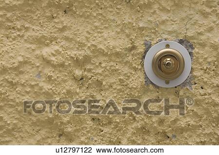 Stock Image - Close-Up, Day, Doorbell, Gold. Fotosearch