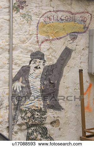 Stock Image - Close-Up, Day, Human Representation, Male Likeness, Mural. Fotosearch