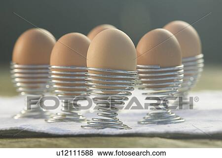 Stock Photo - Close-Up, Egg Cup, Egg, Coil, Arrangement. Fotosearch
