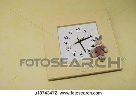 Stock Image - close-up, watch, clock, hands, pointing, object. Fotosearch