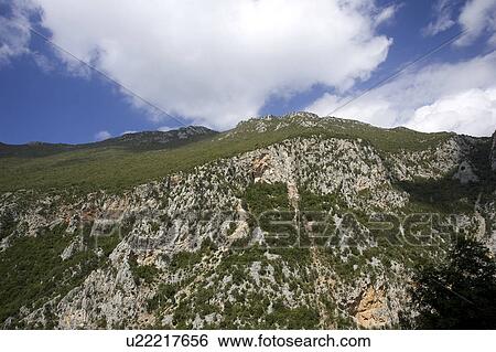 Stock Photograph - Cloud, Generic Location, Grass, Green, Hill. Fotosearch