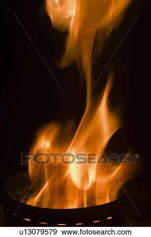 Stock Photo - dancing, explosive, flaming, burnt, background, close-up. Fotosearch