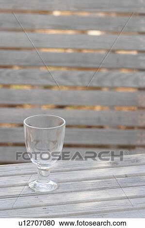 Stock Image - glass, wine glass, stem glass, stemmed glass, standing, upright. Fotosearch