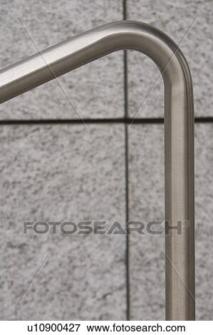 Stock Photo - handle, wall, focus, close-up, bent, shine. Fotosearch