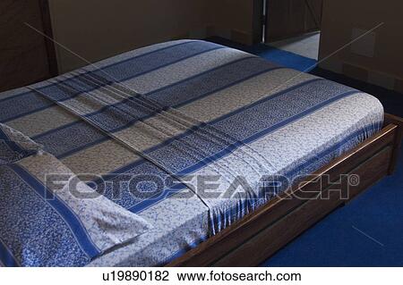 Stock Image - Indoors, Interiors, Bed. Fotosearch