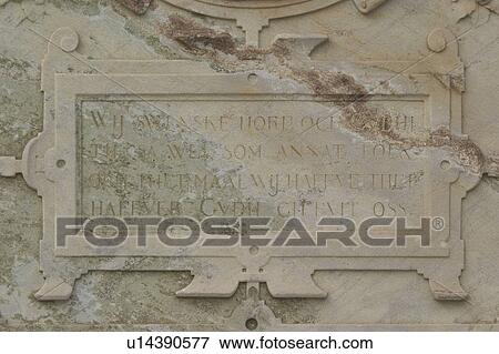 Stock Photo - inscription, emboss, close-up, alphabets, cement, surface. Fotosearch