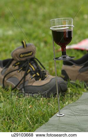 Stock Photo - leather, slip on, sport shoes, lace ups, footwear, grass. Fotosearch