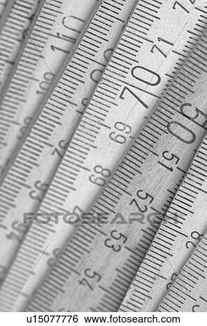 Stock Photograph - measures, inch, dimension, meter, metric, measurement. Fotosearch