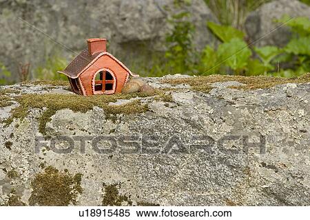 Stock Photography - miniature, small, house, home, fake, replica. Fotosearch