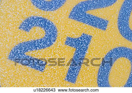 Stock Image - number, numerals, detail, background, winter, season. Fotosearch