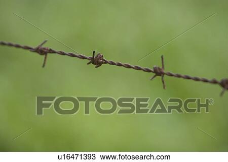 Stock Image - outdoors, barrier, barricade, metallic, design, rough. Fotosearch