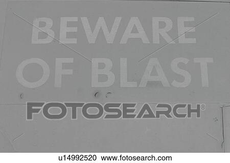 Stock Image - sign, hazard, message, beware of blast, paint, information. Fotosearch