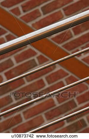 Stock Image - wall, bricks, cement, concrete, iron, shine. Fotosearch