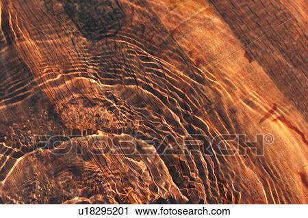 Stock Image - waves, ripples, wood, wooden, wood grain, grainy. Fotosearch