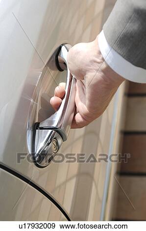 Stock Photo - Hand which opens a door. Fotosearch
