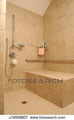 Beautiful shower in an exquisite home featuring universal design - totally accessible shower for those requiring roll-in access and for those without disabilities need no special accommodations. View Large Photo Image Stock Photo - Beautiful shower in an exquisite home featuring universal design - totally accessible shower for those requiring roll-in access and for those without disabilities need no special accommodations.. Fotosearch