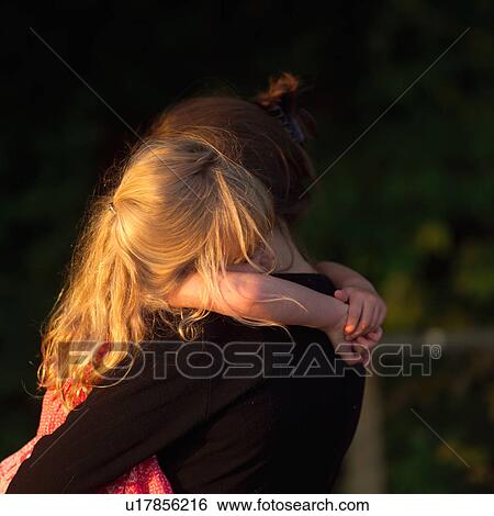 4 year old embracing her Mother's neck View Large Photo Image Stock Photograph - 4 year old embracing her Mother's neck. Fotosearch