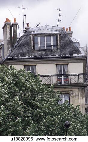 Stock Photograph - A house in Paris, France. Fotosearch