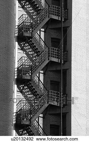 Black and White Photograph of Fire Excape Stairway on Brick Building View Large Photo Image Stock Image - Black and White Photograph of Fire Excape Stairway on Brick Building. Fotosearch