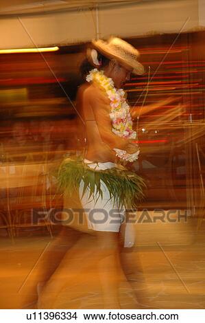 Blurred view of a young woman dancing, Moorea, Tahiti, French Polynesia, South Pacific View Large Photo Image Picture - Blurred view of a young woman dancing, Moorea, Tahiti, French Polynesia, South Pacific. Fotosearch
