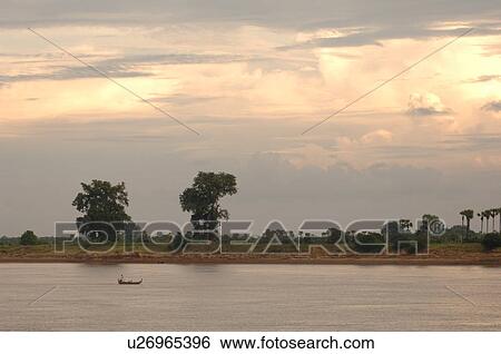 Stock Photograph - Boats on the Irrawaddy River. Fotosearch