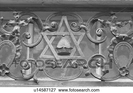 Stock Photo - Carved stone railing at a Jewish establishment. Fotosearch
