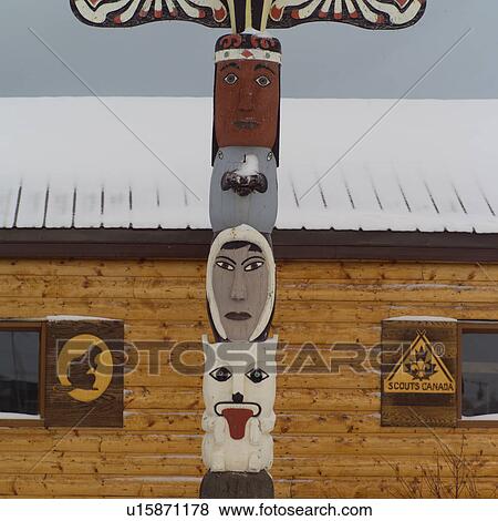 Stock Photo - Churchill Northern Manitoba Faces on Totem Pole. Fotosearch