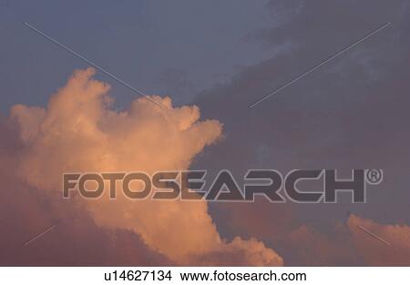 Picture - Cloud formations in the sky over Lake of the woods, Ontario, Canada. Fotosearch