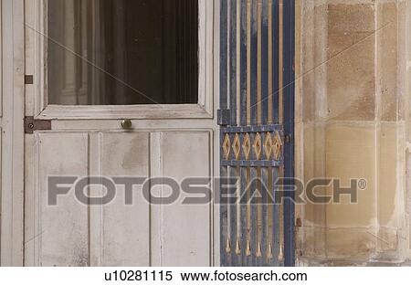 Door with a metallic gate View Large Photo Image Stock Photography - Door with a metallic gate. Fotosearch
