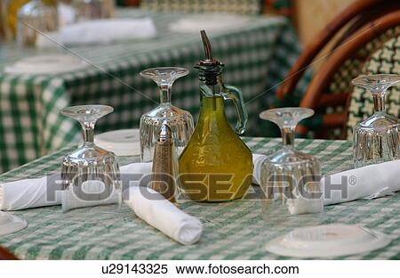 Stock Photography - Drinking table laid with crockery and cutlery. Fotosearch