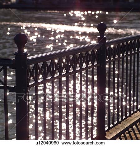 Stock Image - Fencing along pedistrian walkway. Fotosearch