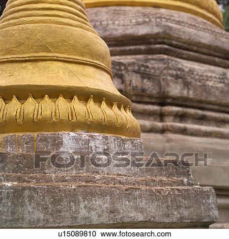 Golden domes on the exterior of a Buddhist Temple View Large Photo Image Stock Image - Golden domes on the exterior of a Buddhist Temple. Fotosearch