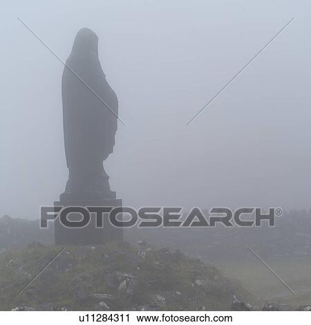 Ireland - Ring of Kerry - Statue in Fog View Large Photo Image Stock Image - Ireland - Ring of Kerry - Statue in Fog. Fotosearch