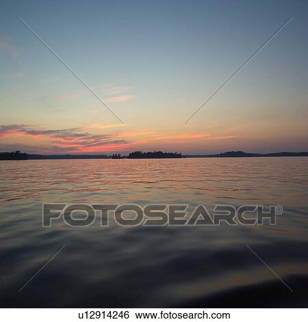Stock Photograph - Lake of the Woods at Twilight. Fotosearch