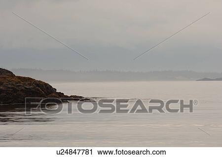 Stock Image - Low cloud over ocean, Pacific Rim National Park, Vancouver Island, Canada. Fotosearch