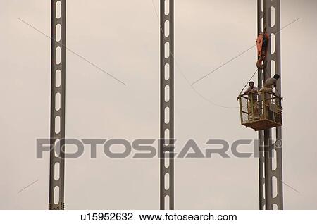 Men working on girders View Large Photo Image Stock Image - Men working on girders. Fotosearch