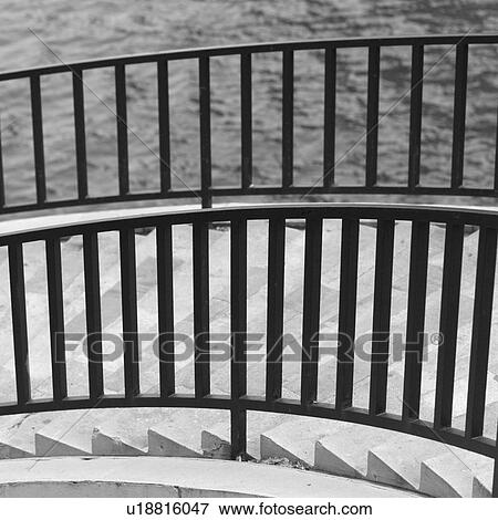 Metal handrail of a staircase View Large Photo Image Stock Photo - Metal handrail of a staircase. Fotosearch