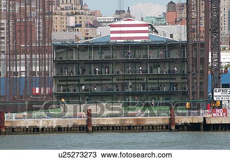 Stock Image - New York City - Golf Practice. Fotosearch