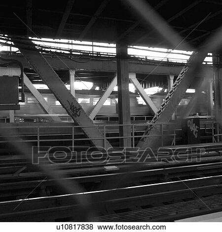Stock Photo - Pedestrian walkway on Manhattan Bridge, New York City. Fotosearch