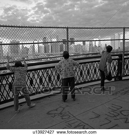 Pedestrians on Manhattan Bridge, New York City View Large Photo Image Stock Photo - Pedestrians on Manhattan Bridge, New York City. Fotosearch