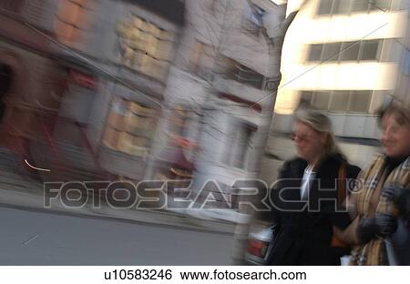People walking on the sidewalk in Montreal, Canada View Large Photo Image Stock Photograph - People walking on the sidewalk in Montreal, Canada. Fotosearch
