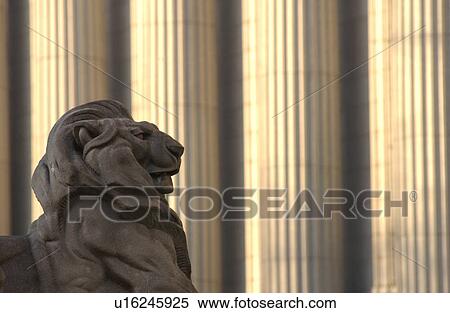 Stock Photography - Statue of a lion outside a building in Montreal, Canada. Fotosearch