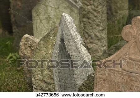 Stock Photograph - Tomb stones at a Jewish establishment in Prague. Fotosearch