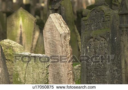 Stock Photography - Tomb stones at a Jewish establishment in Prague. Fotosearch