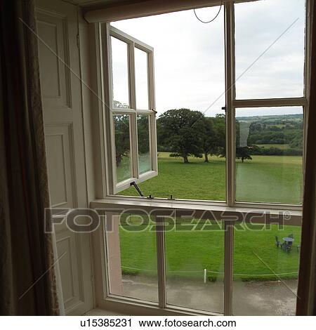 Stock Image - Window looking onto field. Fotosearch