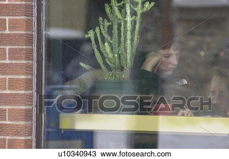 Woman at Cafe Through the Window View Large Photo Image Stock Image - Woman at Cafe Through the Window. Fotosearch