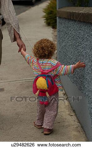 Young Child Walking With Parent View Large Photo Image Stock Photograph - Young Child Walking With Parent. Fotosearch