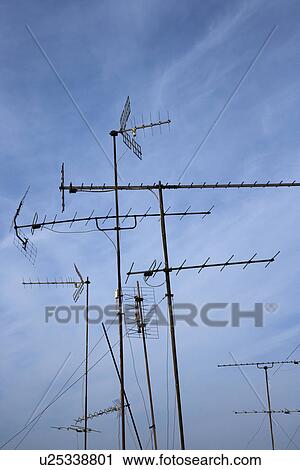 Antennas against blue sky View Large Photo Image Stock Image - Antennas against blue sky. Fotosearch